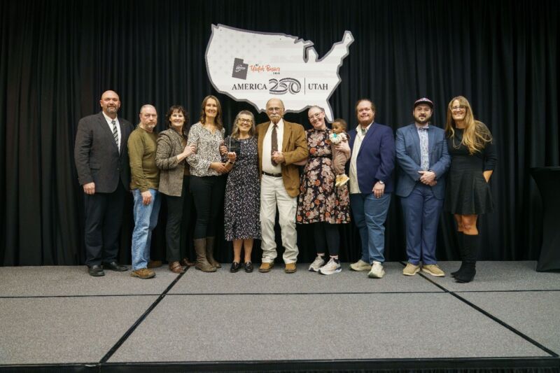 Pictured with her family, Marcia Barber accepts her 2026 UBTech Champion Award from UBTech President Aaron Weight (left) during the President’s Champions Gala.